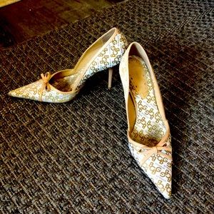 BCBGirls beige and tan shoes.